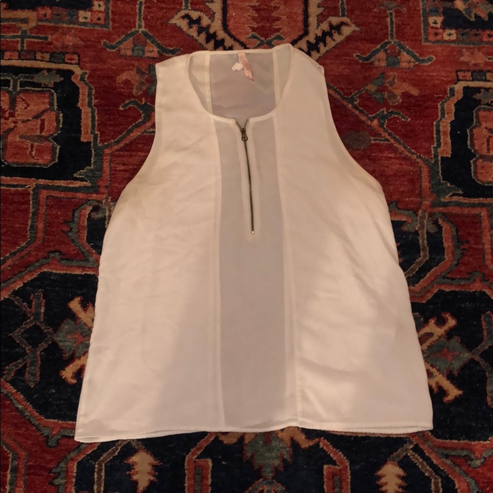 White sheer sleeveless blouse